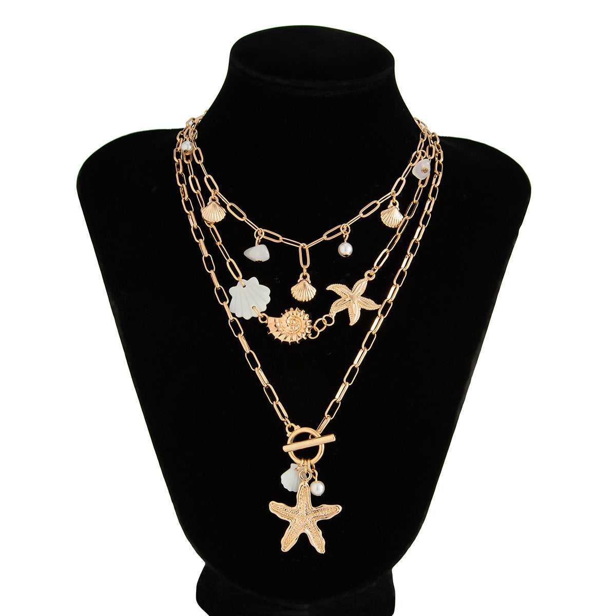 European and American cross-border ocean-themed ins style seashell, starfish, and conch necklace for women; fashionable imitation pearl and pebble chain necklace.